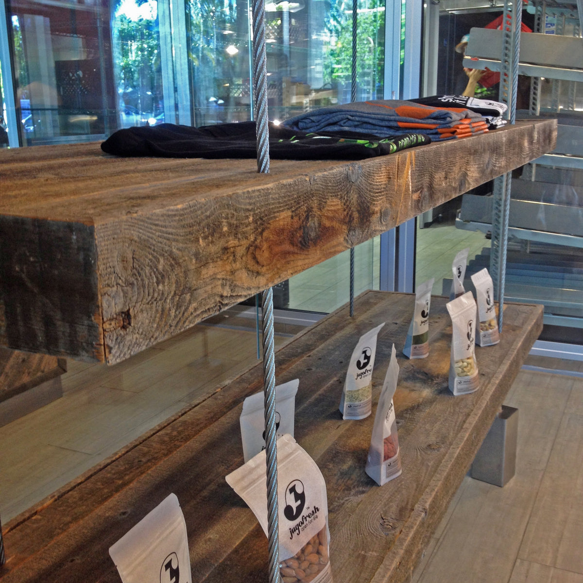 Custom shelves made from reclaimed wood in a restaurant gift shop.