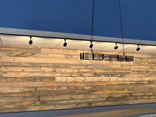 Bulk reclaimed wood paneling in the brushed, light brown  Cheyenne finish.