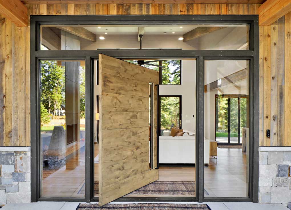 Reclaimed wood siding on an entrance in the Cheyenne finish on an exterior by Eide Homes in Cle Elum, WA