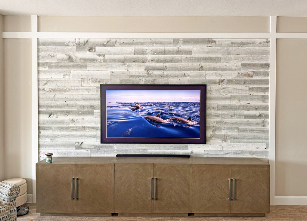 Board and batten style accent wall in a mid-century modern tv room in Florida