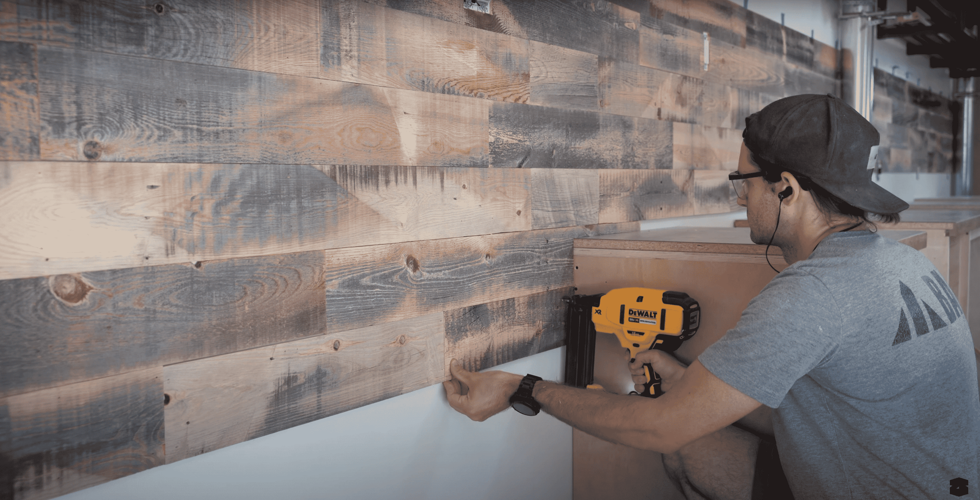 Reclaimed wood planks installed in a woodshop