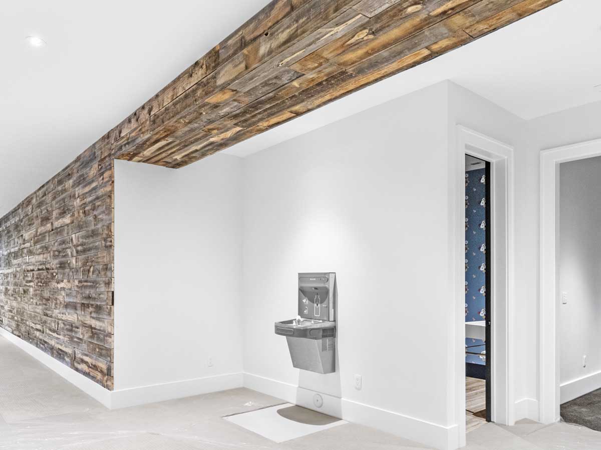 Custom reclaimed wood wall and ceiling section by Apen Lane Homes