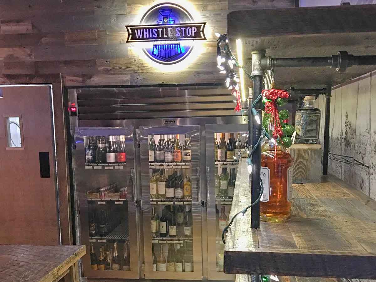 horizontal reclaimed wood wall at the Cavalryman restaurant in Laramie, WY.