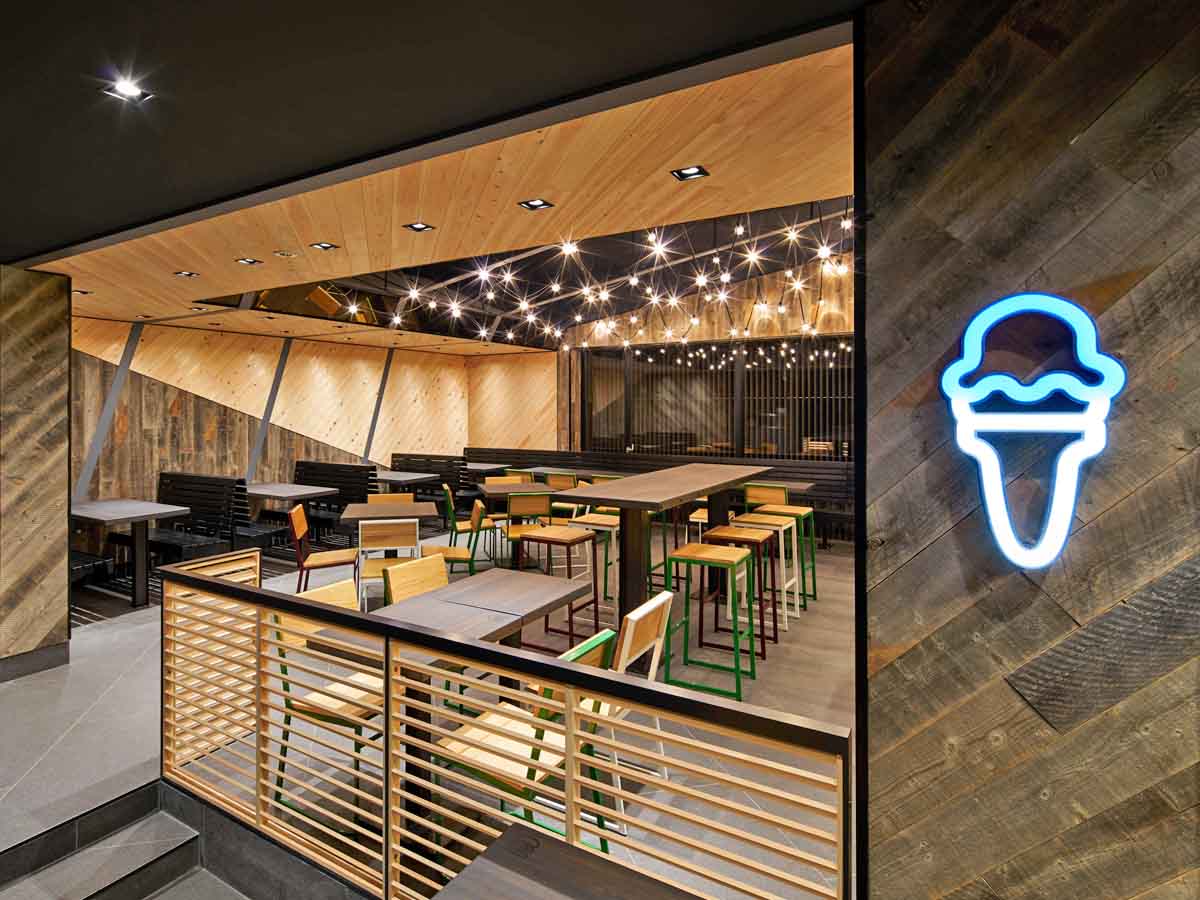 Reclaimed wood wall installed diagonally at a Shake Shack in Tokyo, Japan.