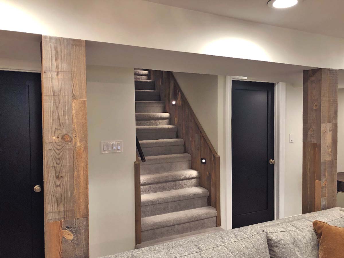 Reclaimed wood beams in a basement