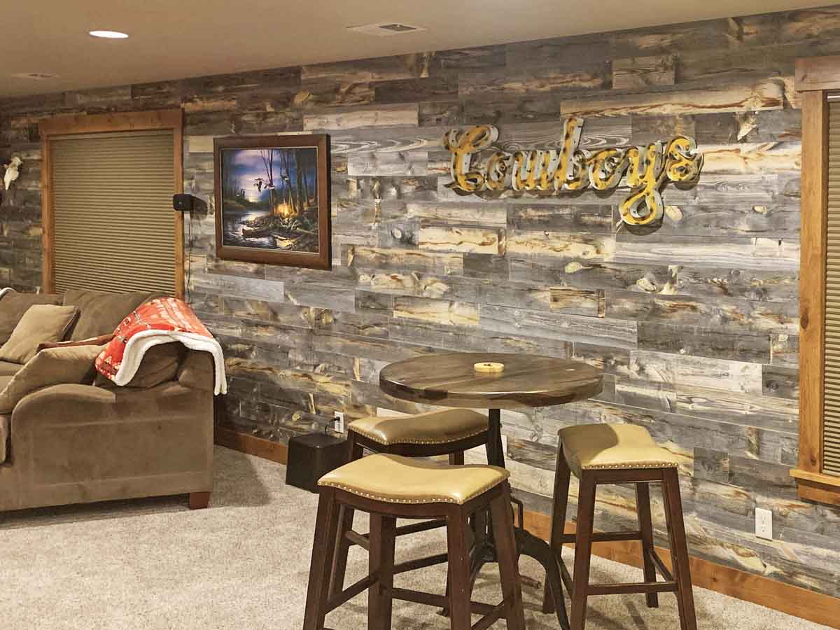 Reclaimed wood wall in a rustic style, basement man cave.
