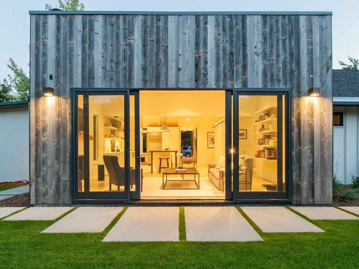 Grey, vertical reclaimed wood siding on the Old Major project by Surround Architecture in Denver, CO.
