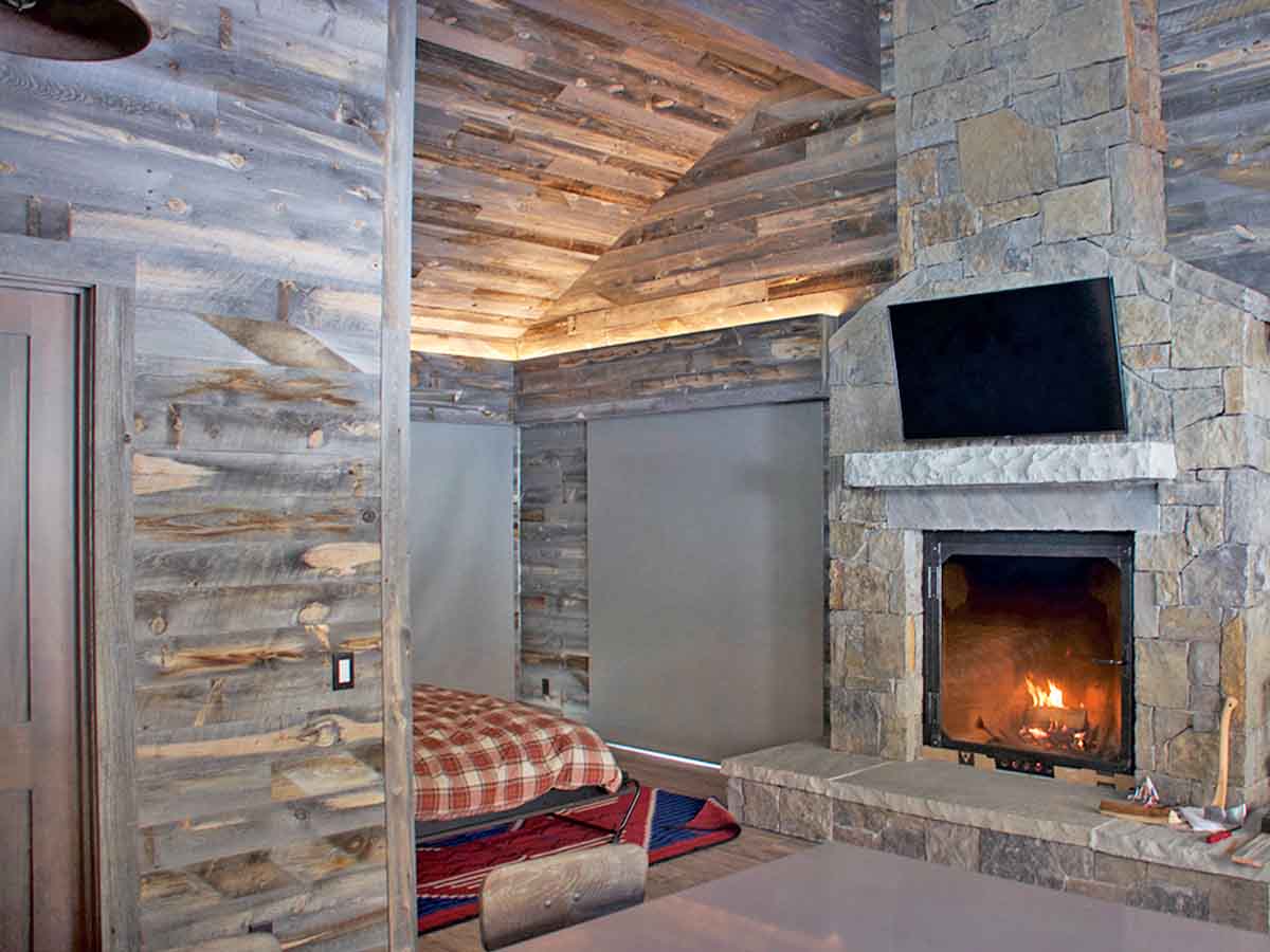 Aspen ski house with grey reclaimed wood walls and ceilings.