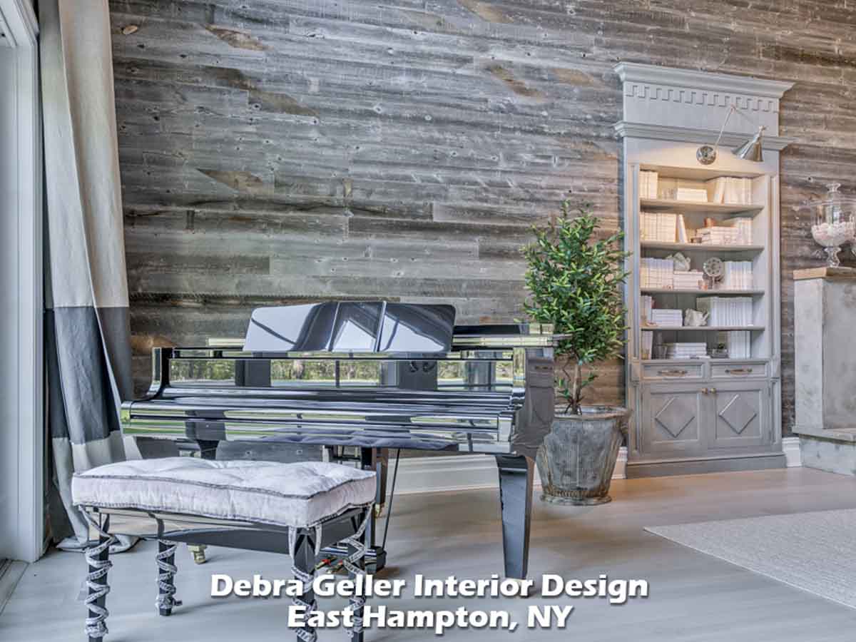 A large, grey reclaimed wood accent wall in a transitional living room with a grand piano.