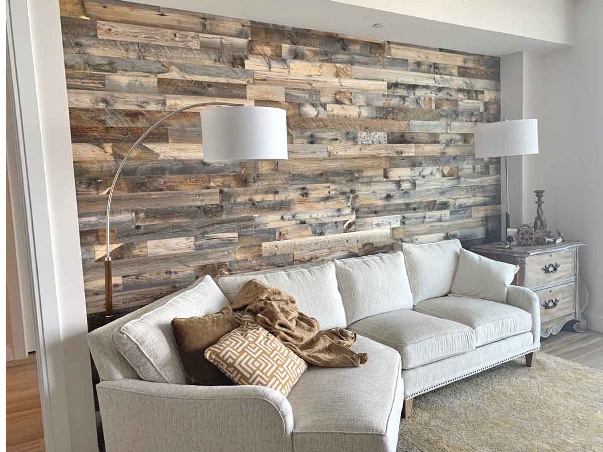 brown and grey reclaimed wood wall in a traditional living room.