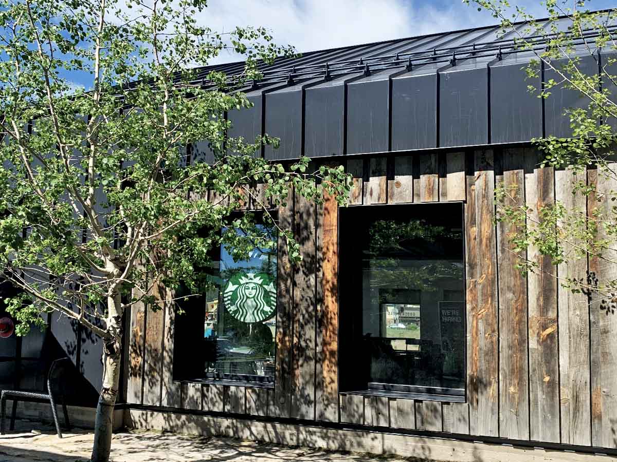 Board-on-Board reclaimed wood siding on a Starbucks in Summit Co Colorado in Springtime.