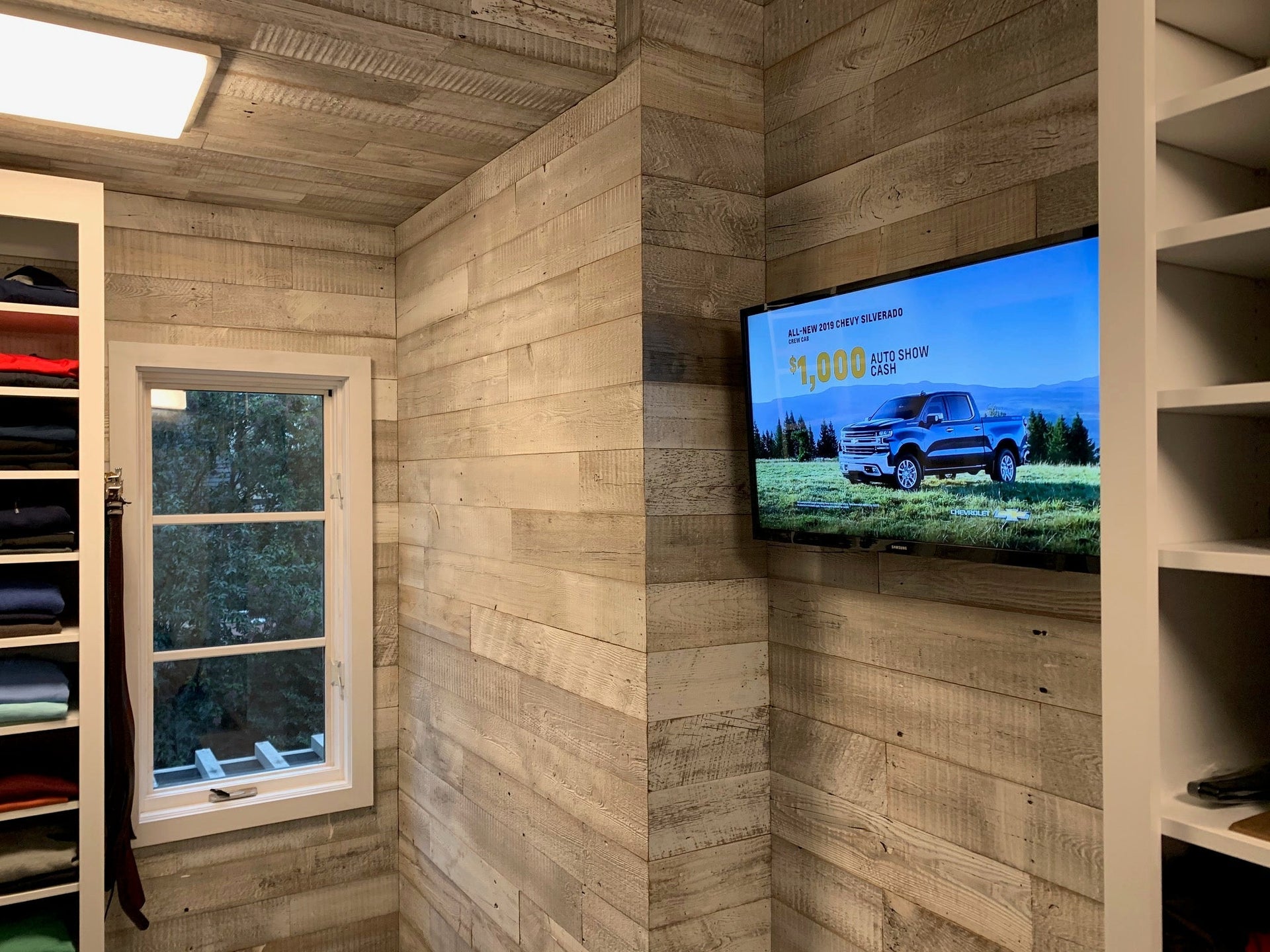 Custom closet clad in reclaimed wood boards in North Carolina