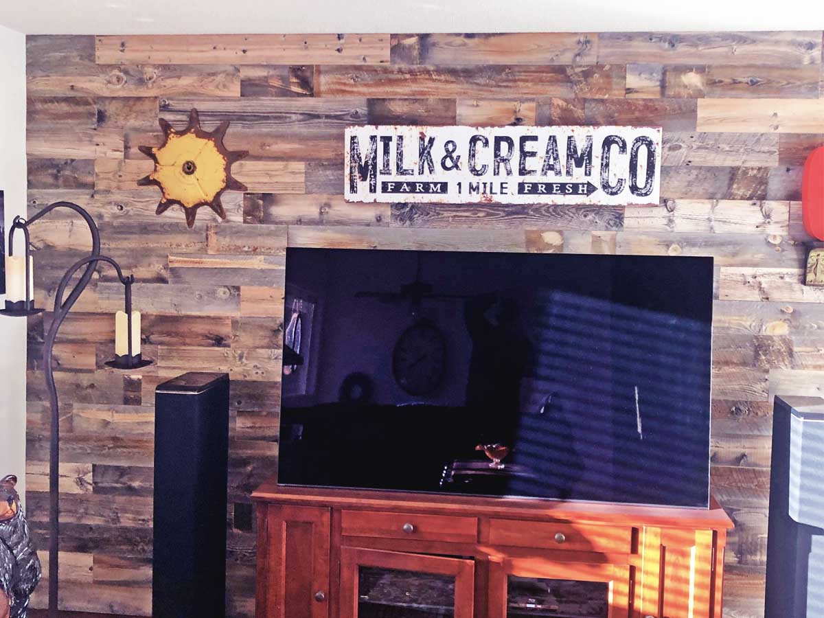 Reclaimed wood wall with farmhouse decor