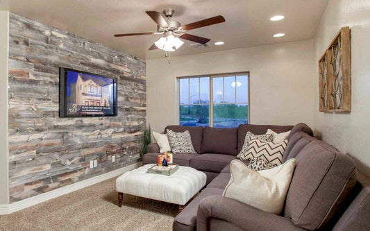 A reclaimed wood wall by Bellago Homes inside a newly constructed house.