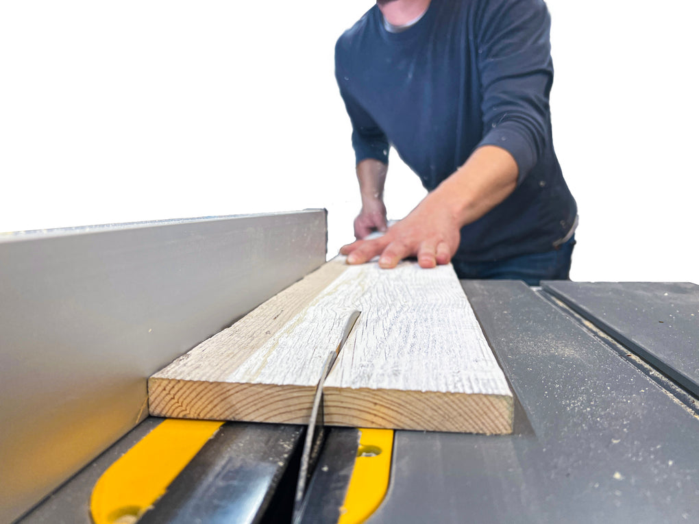 Centennial Woods' Ready-To-Rip Trim in Sundance White are 6 foot long weathered nominal 1x 6 boards with flat sanded bottom ready to go through a table saw to make custom sized trim for windows, doors, and baseboards.