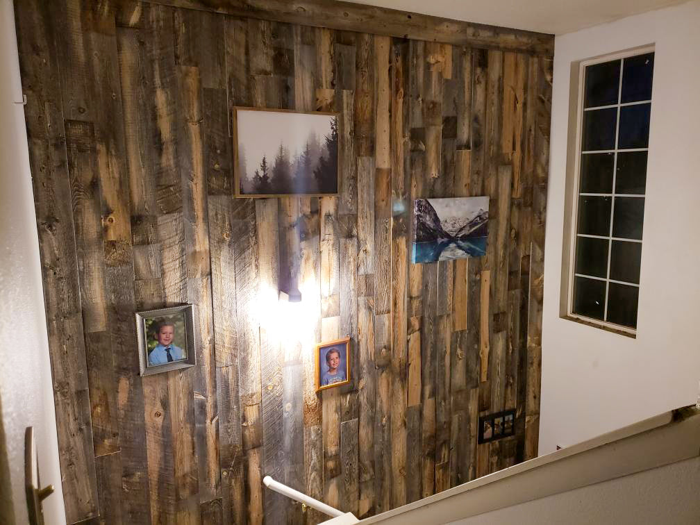 Tall accent wall made with Salvaged Wood Planks from Centennial Woods.