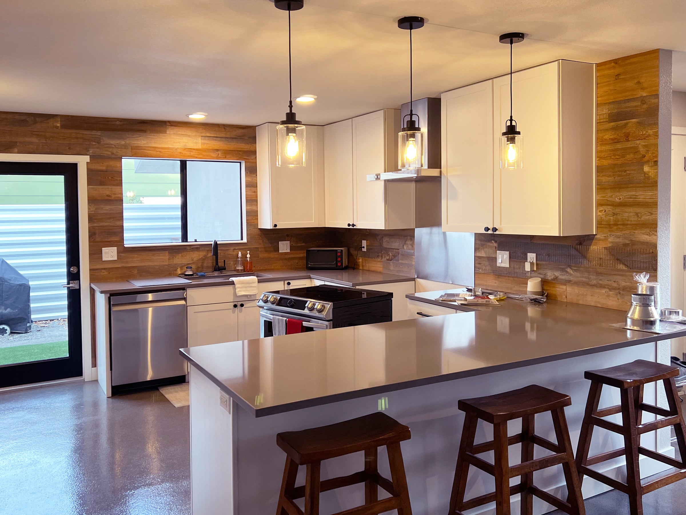 Bulk reclaimed wood paneling installation