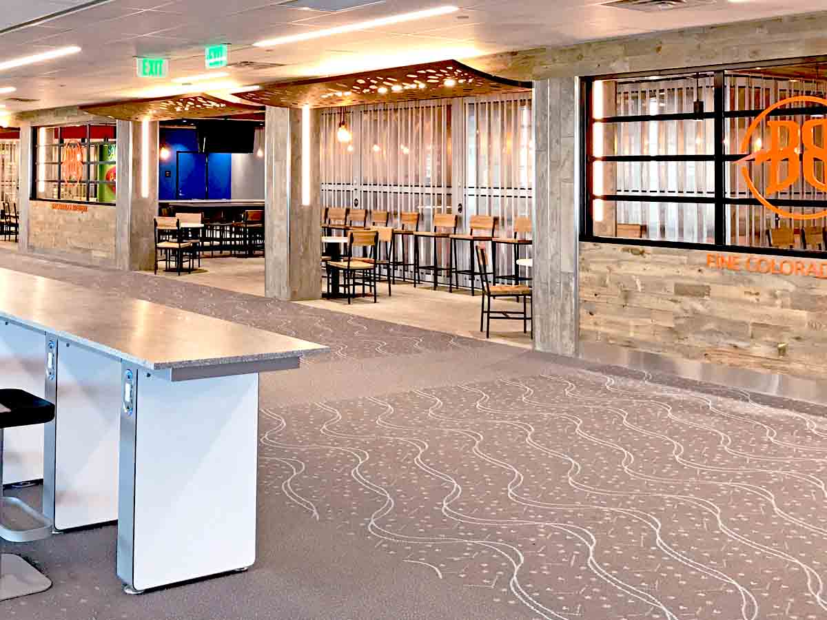 Biophilic design element of reclaimed wood paneling used at Denver International Airport