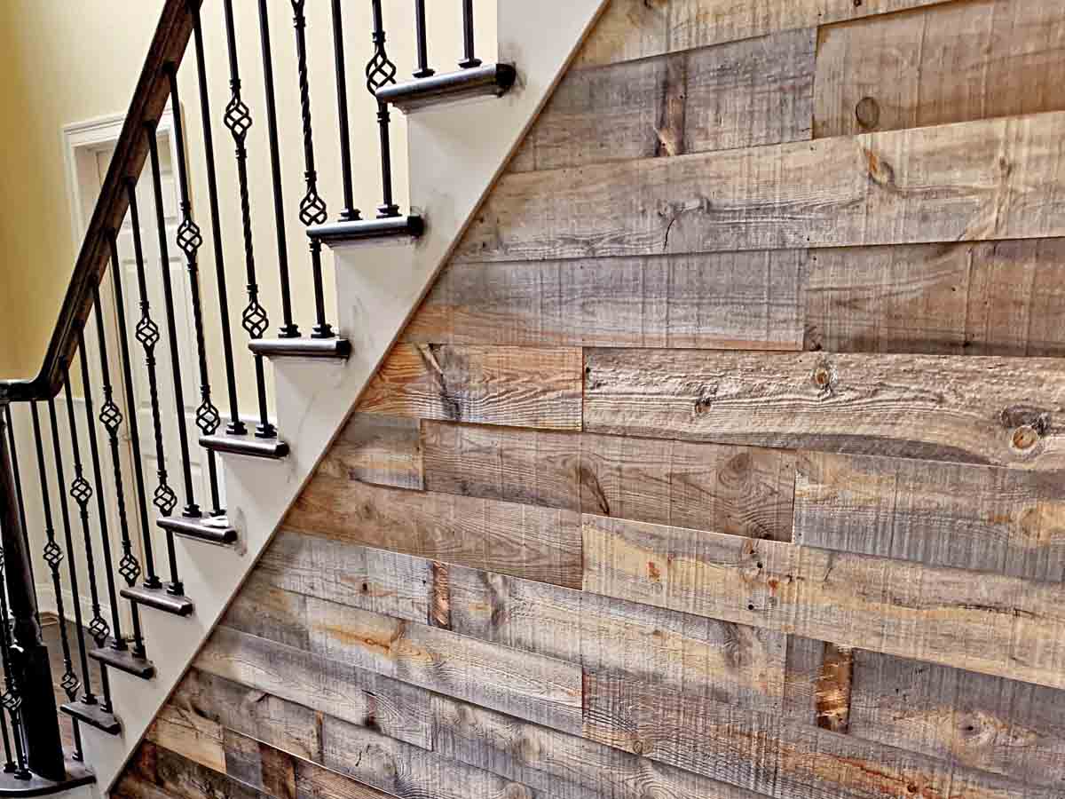 Staircase clad with reclaimed wood boards 