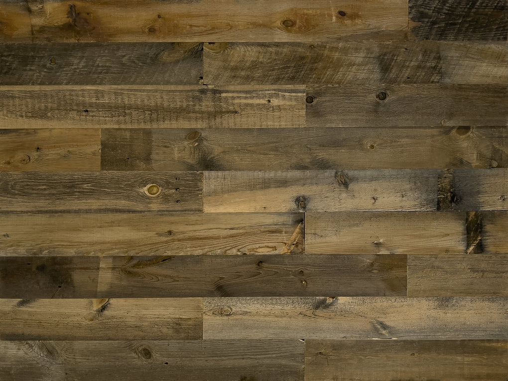 Wall planks made from brown tinted reclaimed wood, the Saratoga finish from Centennial Woods