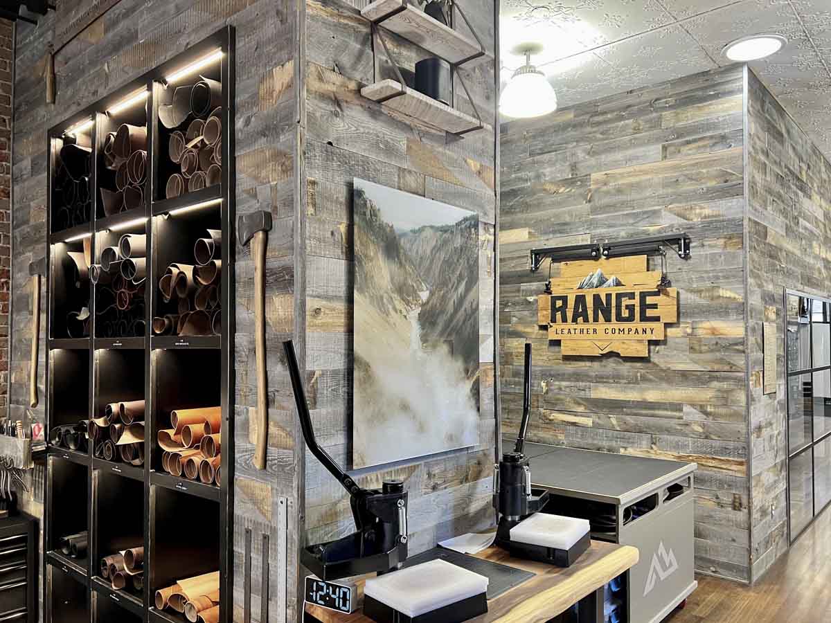 Reclaimed wood walls in Range Leather Company's shop.