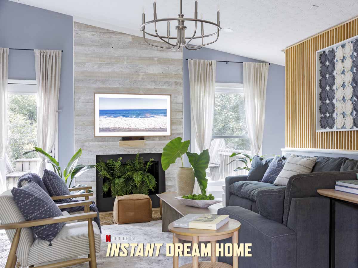 Whitewash reclaimed wood planks on a fireplace surround as featured on episode 2 of the Netflix series Instant Dream Home