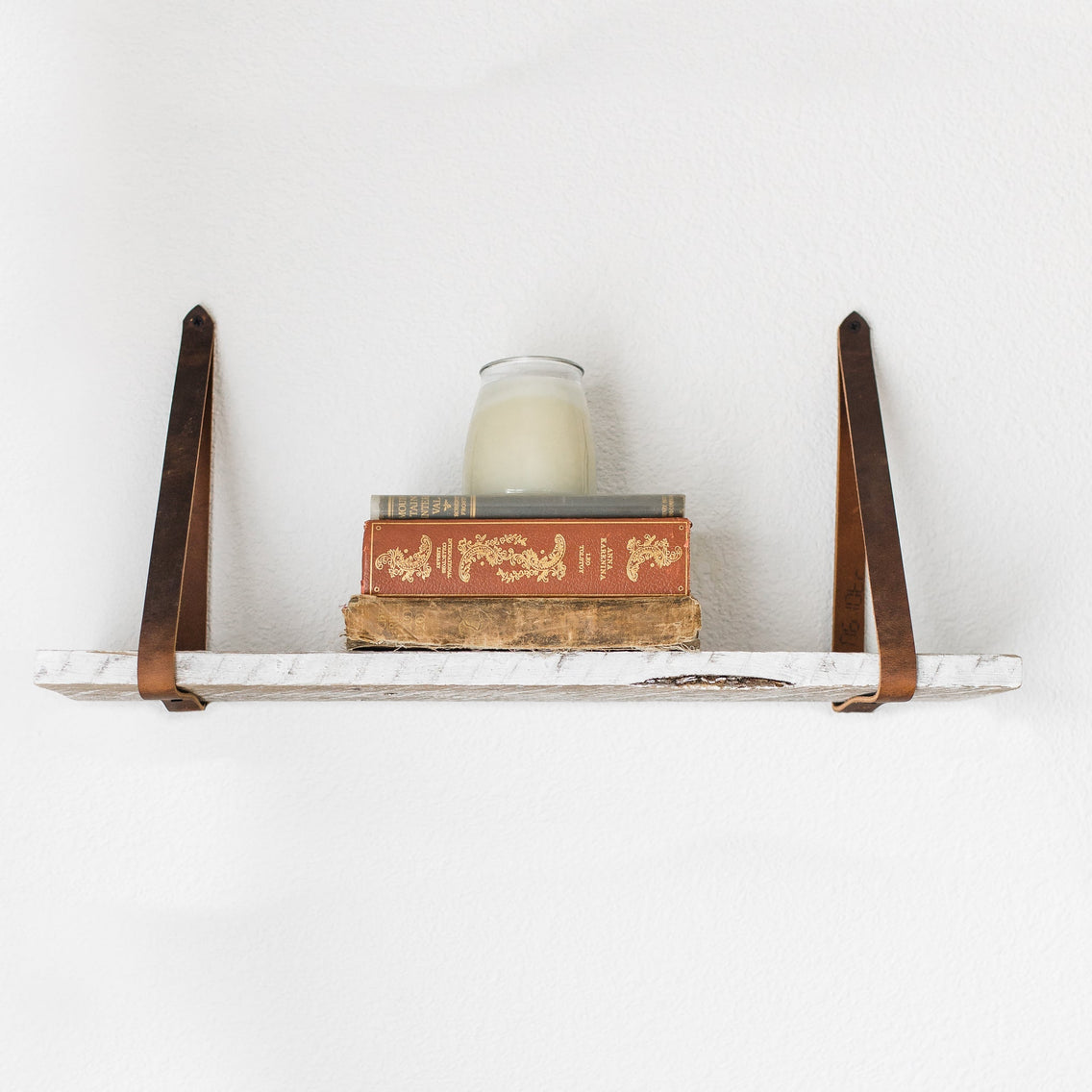Leather strap reclaimed wood wall shelf in white wash