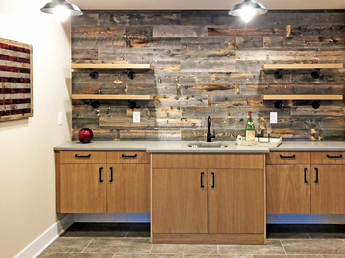 Reclaimed wood wall with industrial shelving