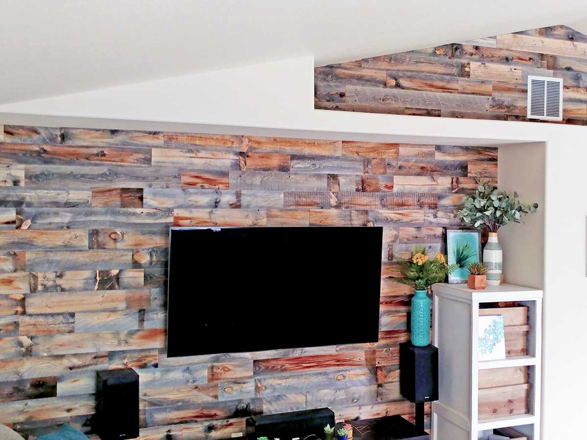 Reclaimed wood wall with an alcove in a tv room